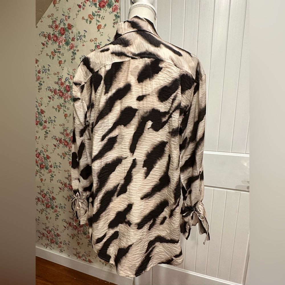 Black and cream zebra print button up blouse with tie at wrist and ruffle cuff - Picture 4 of 7
